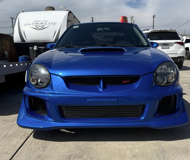 Blue Subaru WRX Fiberglass Bumper Repair and Paint
